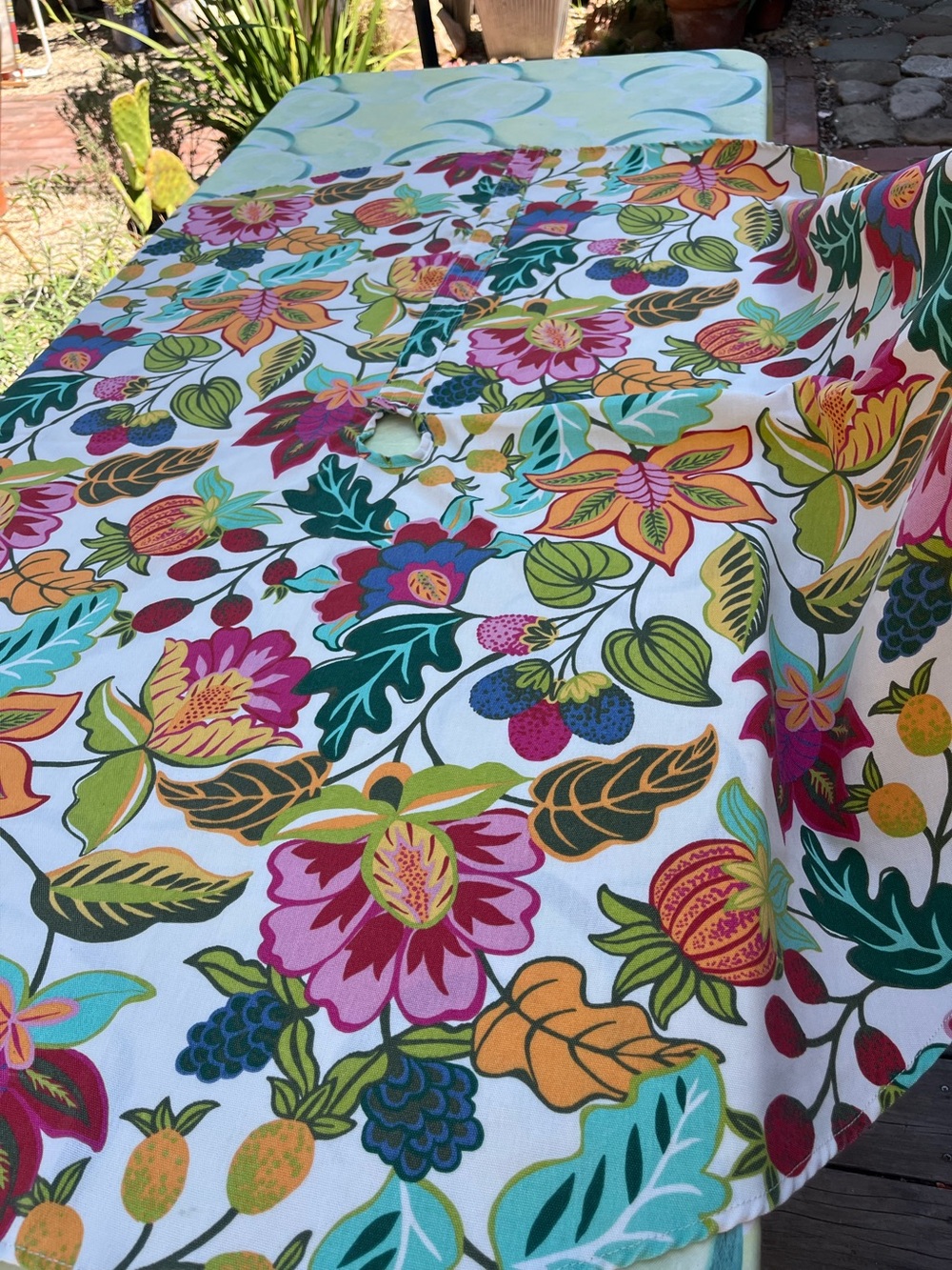 Round floral table cloth with umbrella whole by world market.